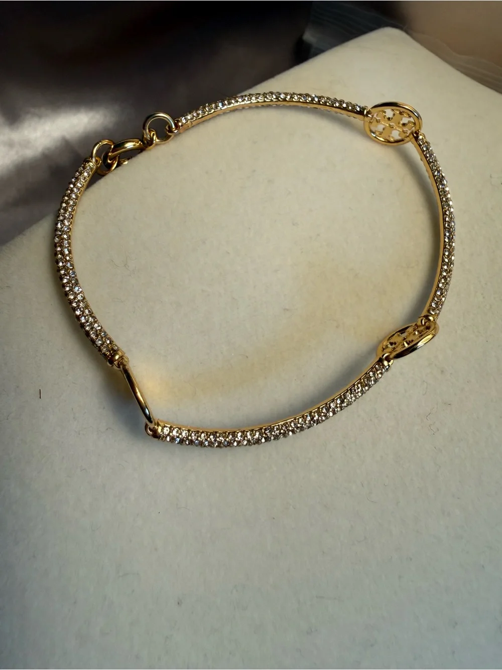 Gold Crystal Pavé Bangle Bracelet with Logo Discs